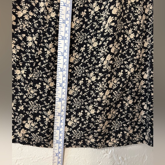 SOLD. Black Skirt, nude flower print. Flattering, nice fall to it. - Picture 6 of 7